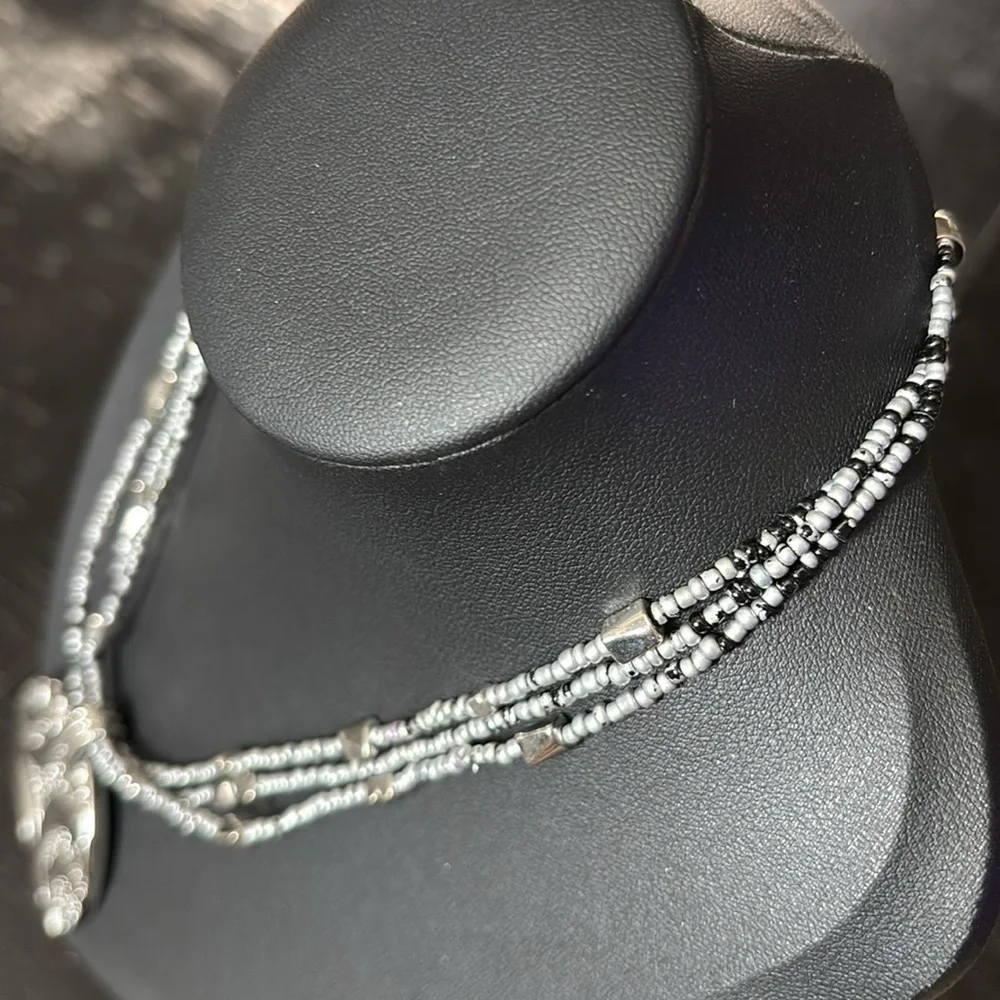Lia Sophia Silver Tone Multistrand Beaded Circle Pendant
